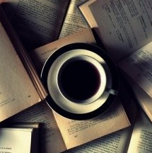 coffee on a pile of books