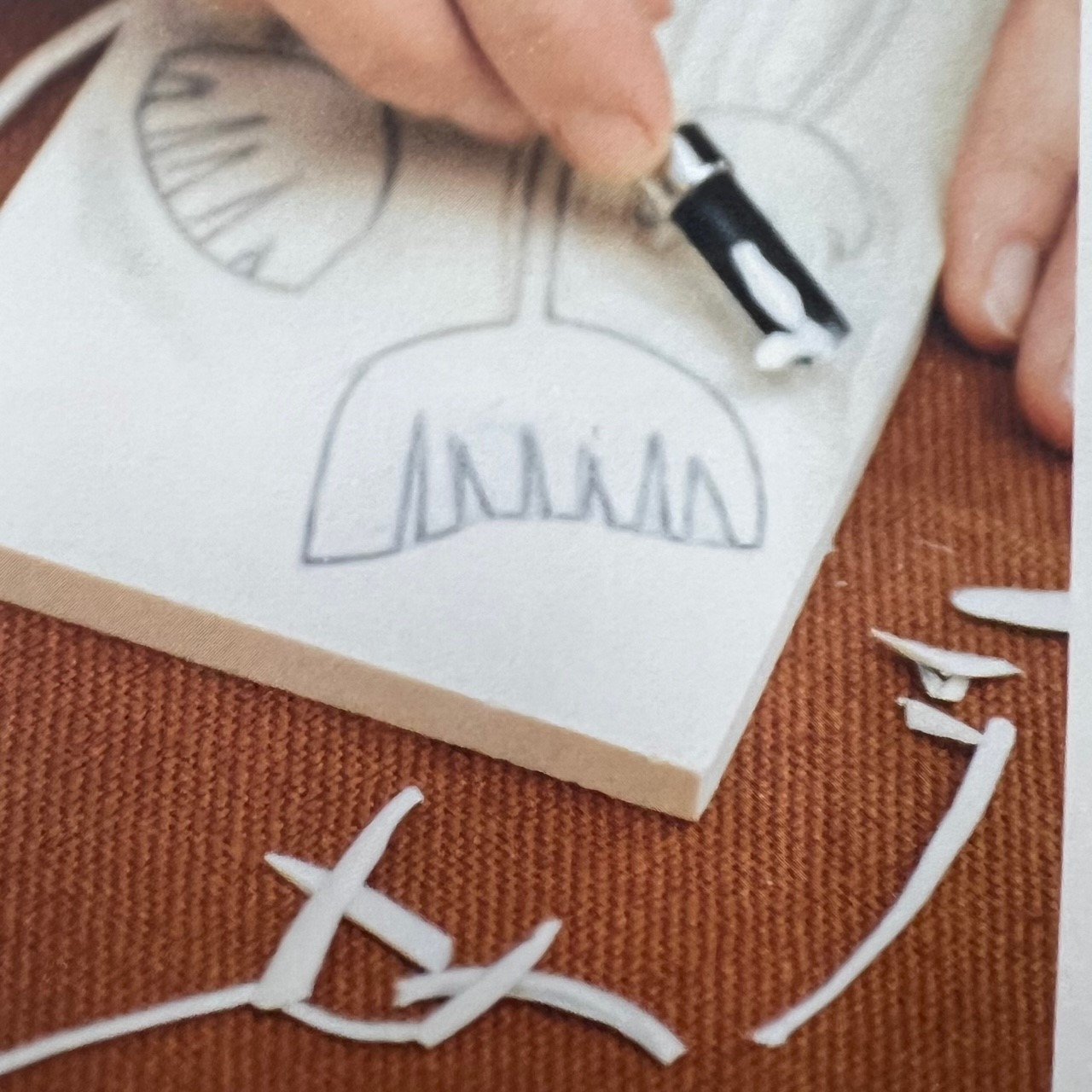 a picture of someone making a block print